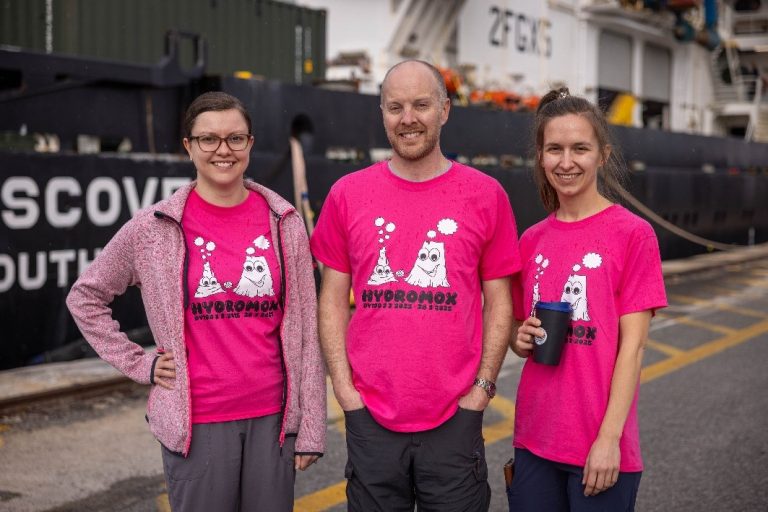 (Left to right): Erin Bethell, John Jamieson, and Jennifer Spalding in front of the RRS Discovery. Photo credit: Dan Bourne.